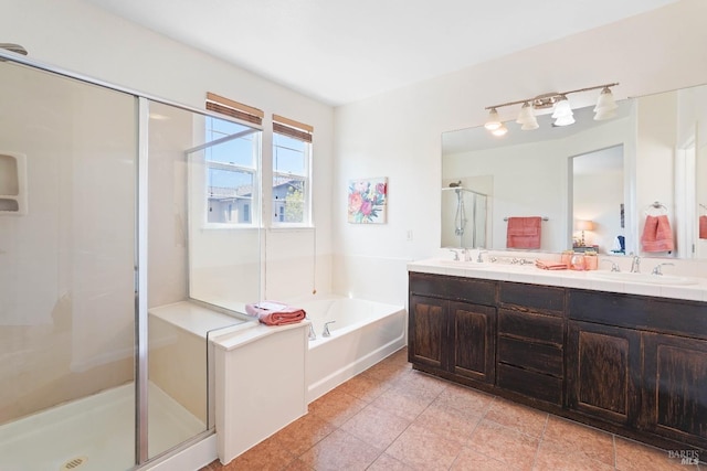 1606 Chamberlain Dr, Fairfield, CA 94533 - bathroom featuring tile patterned flooring, a shower stall, double vanity, a sink, and a garden tub