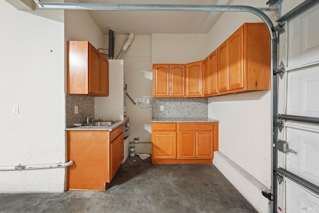 1606 Chamberlain Dr, Fairfield, CA 94533 - kitchen with a sink, backsplash, and brown cabinetry