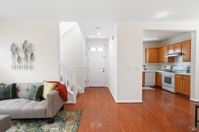 1606 Chamberlain Dr, Fairfield, CA 94533 - living room with baseboards, stairway, wood finished floors, and recessed lighting