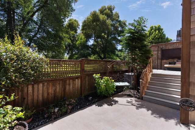 view of patio with fence