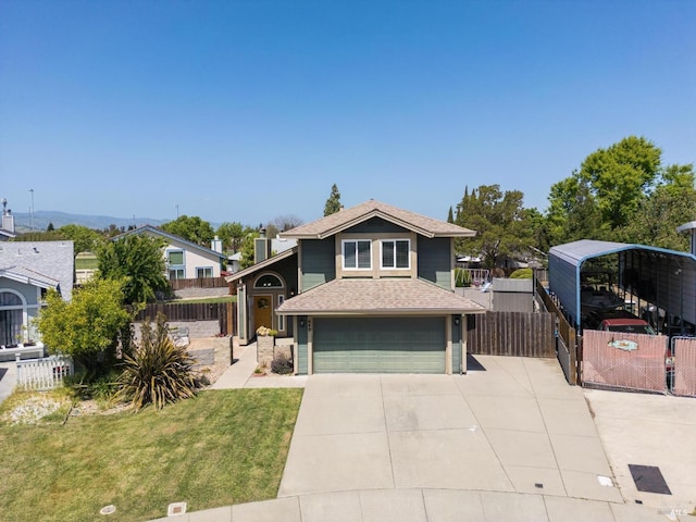 view of front of property featuring driveway, roof with shingles, an attached garage, fence, and a front lawn