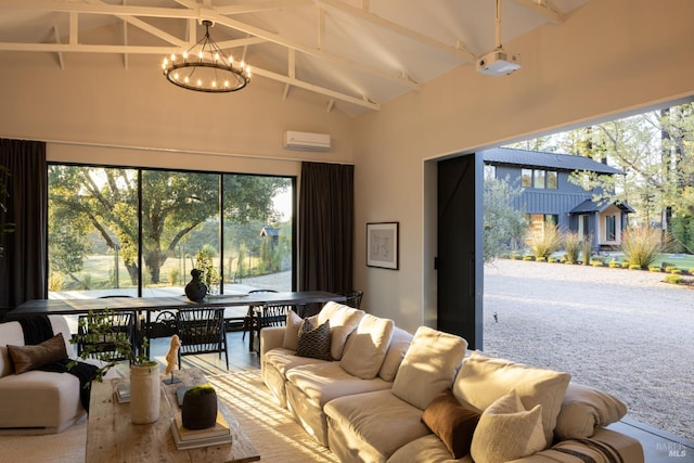 living room featuring high vaulted ceiling, a wall mounted AC, a notable chandelier, and a wealth of natural light