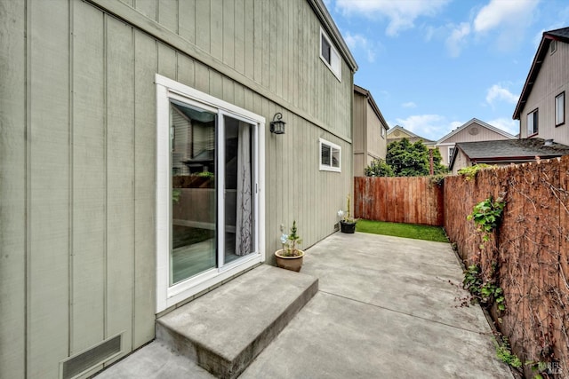 view of patio / terrace featuring visible vents and a fenced backyard