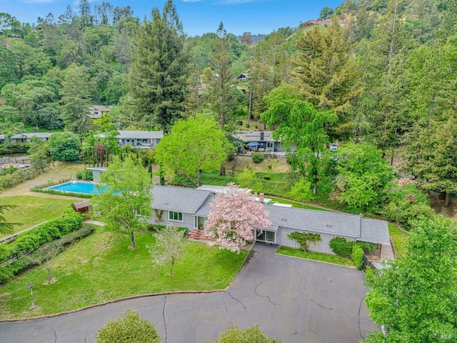 drone / aerial view with a forest view