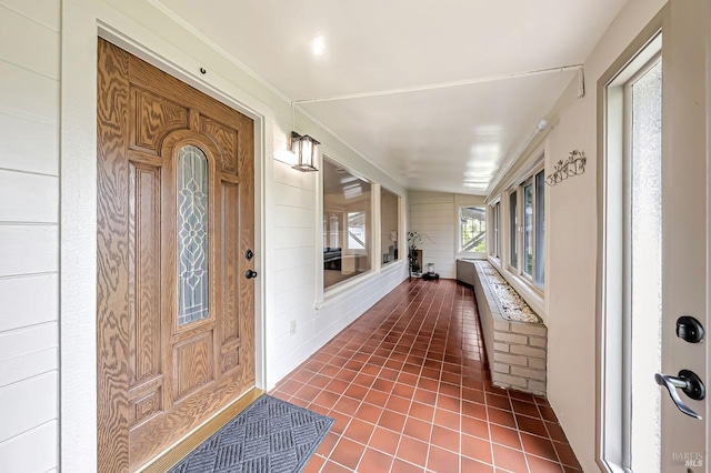 doorway to property featuring a porch