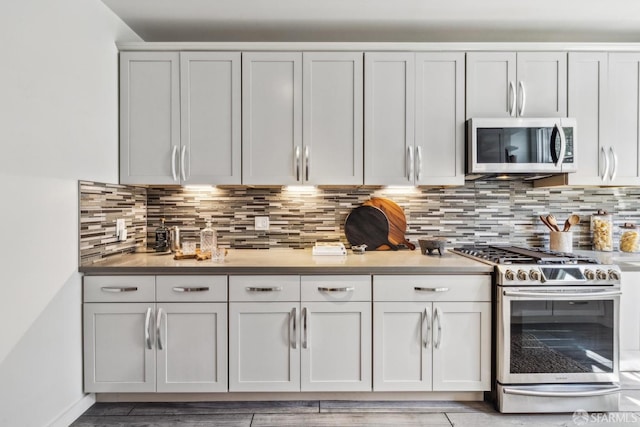 22 Wood St, San Francisco, CA 94118 - interior space featuring stainless steel appliances, backsplash, and light countertops