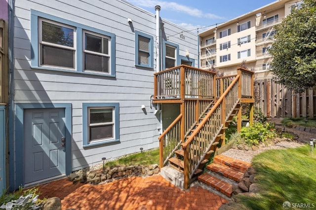 22 Wood St, San Francisco, CA 94118 - rear view of property featuring fence, a deck, and stairs