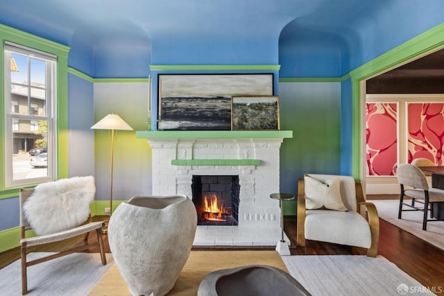 22 Wood St, San Francisco, CA 94118 - living area with wood finished floors, a fireplace, and baseboards