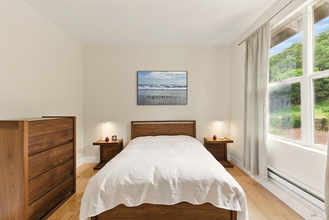 401 N Ave Unit 310, San Rafael, CA 94903 - bedroom featuring a closet, baseboards, and light wood-type flooring