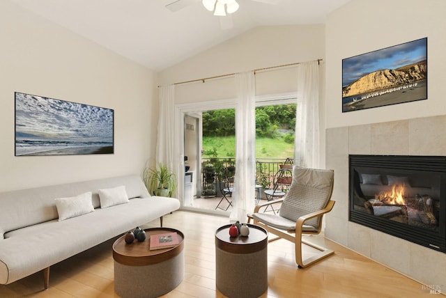 401 N Ave Unit 310, San Rafael, CA 94903 - sitting room with stacked washer and dryer, a ceiling fan, vaulted ceiling, and light wood-style floors