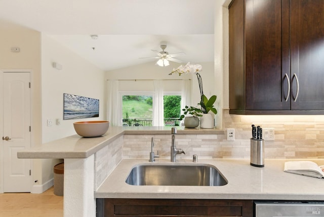 401 N Ave Unit 310, San Rafael, CA 94903 - kitchen with dark brown cabinetry, dishwasher, baseboards, a sink, and backsplash