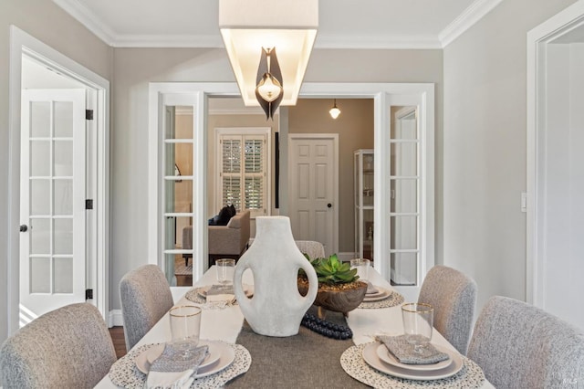 dining area with crown molding