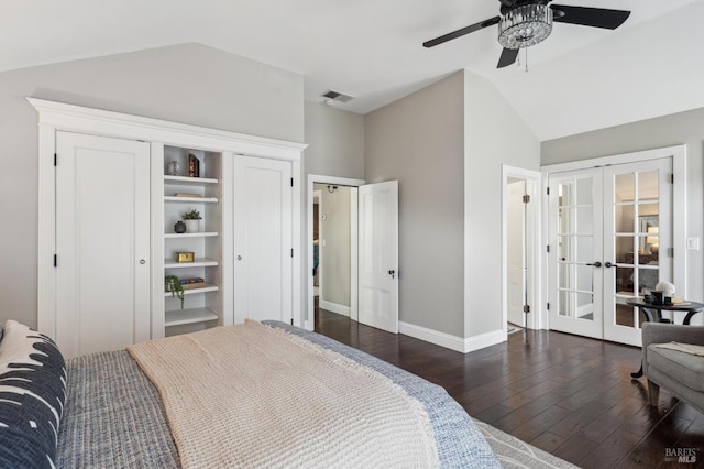 bedroom featuring visible vents, wood finished floors, french doors, and lofted ceiling