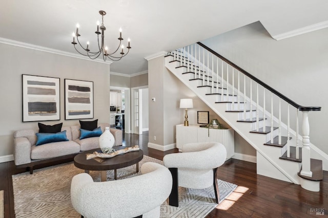 living area featuring an inviting chandelier, wood finished floors, stairs, and baseboards