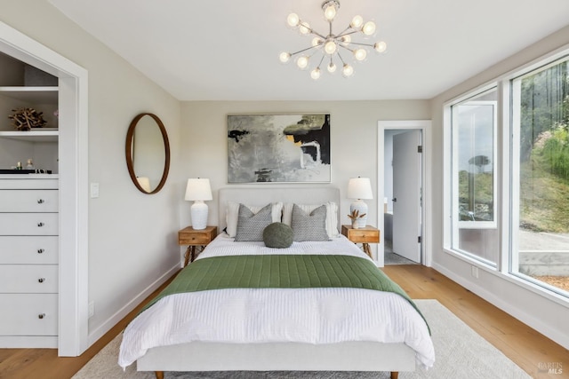 28 Timothy Ave, San Anselmo, CA 94960 - bedroom featuring a chandelier and wood finished floors
