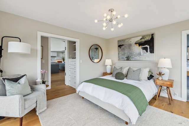 28 Timothy Ave, San Anselmo, CA 94960 - bedroom with a chandelier and wood finished floors