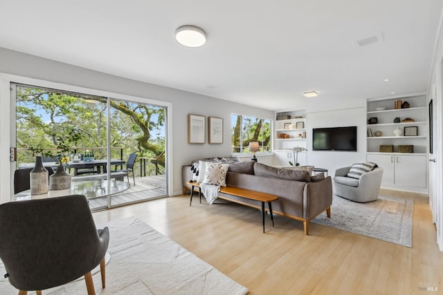 28 Timothy Ave, San Anselmo, CA 94960 - living area with healthy amount of natural light, light wood-style floors, and built in features