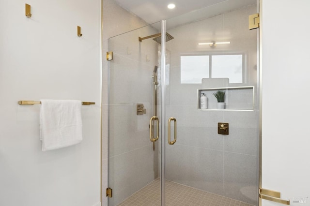 bathroom featuring a shower stall