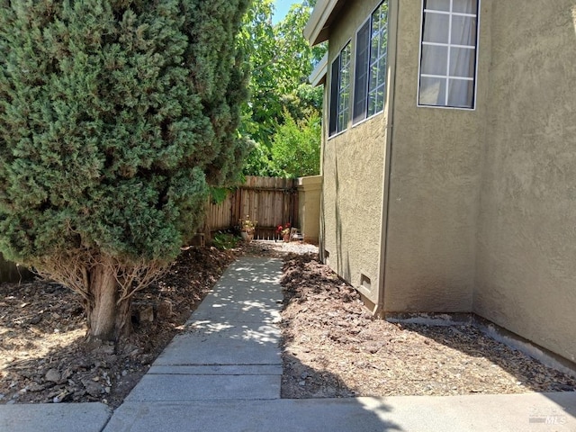 2998 Burl Ct, Fairfield, CA 94533 - view of property exterior featuring fence and stucco siding