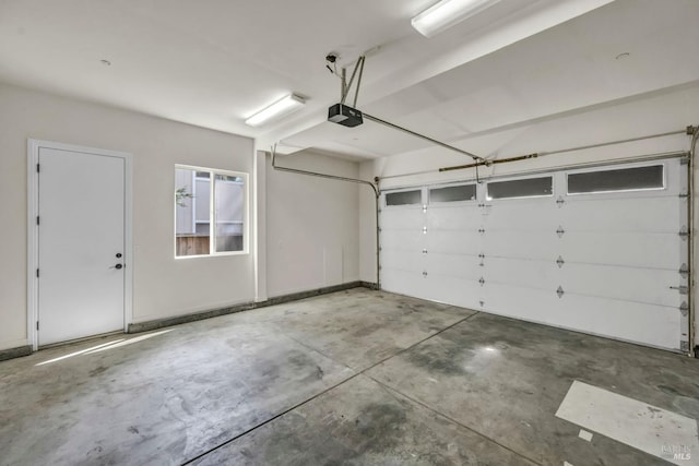 garage featuring a garage door opener