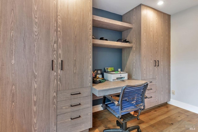 office area with recessed lighting, baseboards, and wood finished floors
