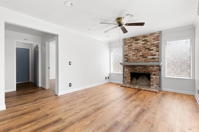 unfurnished living room with ceiling fan, a healthy amount of sunlight, and light wood finished floors