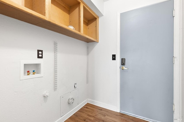 clothes washing area with hookup for an electric dryer, washer hookup, baseboards, wood finished floors, and laundry area
