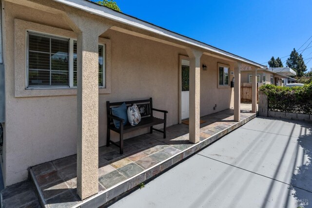 view of patio with fence