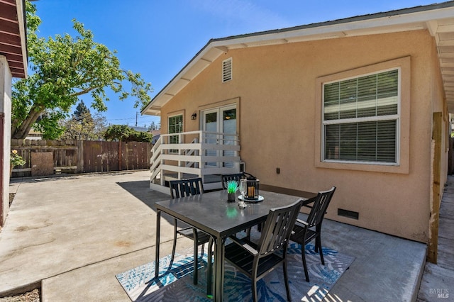 view of patio / terrace with fence and outdoor dining space