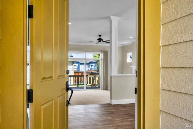 corridor featuring ornamental molding, recessed lighting, wood finished floors, and baseboards