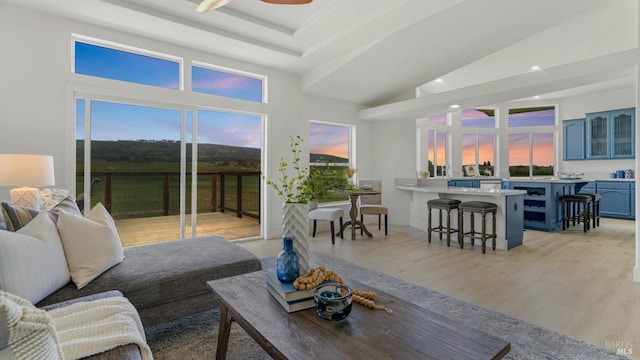 living area with ceiling fan, recessed lighting, and light wood-style flooring
