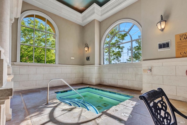 view of pool featuring an indoor hot tub