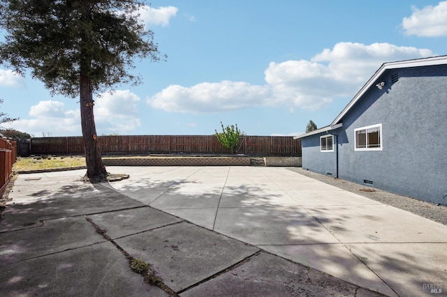 view of patio with a fenced backyard