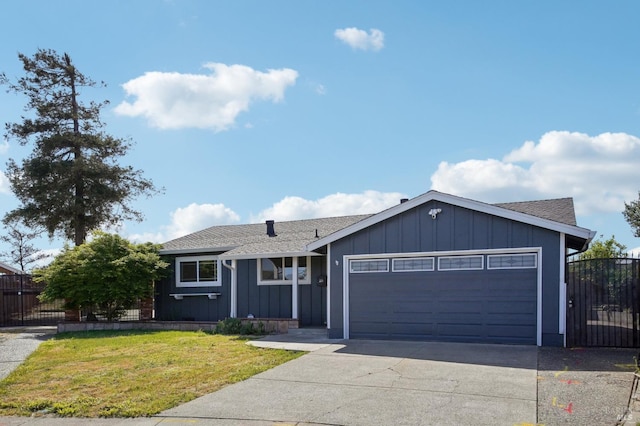 single story home with a front yard, a garage, a shingled roof, driveway, and fence