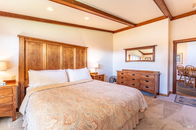 bedroom with beam ceiling, light colored carpet, recessed lighting, and baseboards