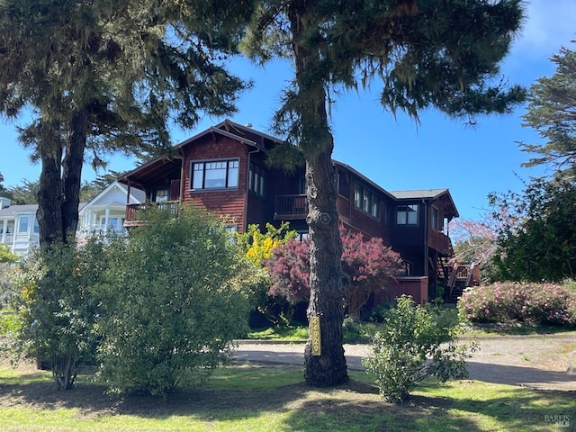 view of property exterior with stairs