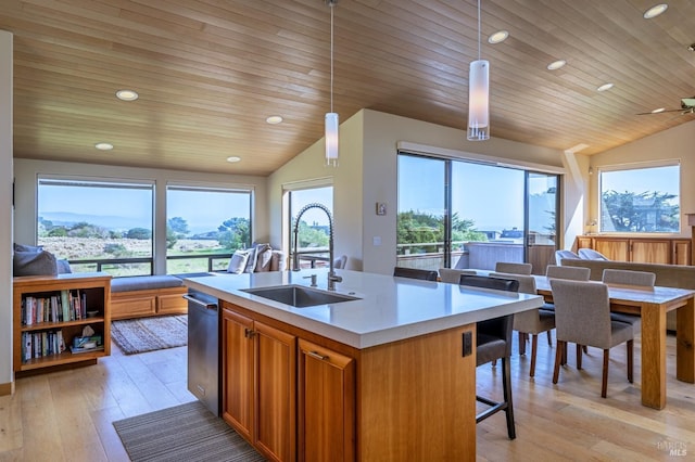 kitchen featuring a sink, light countertops, wooden ceiling, dishwasher, and vaulted ceiling