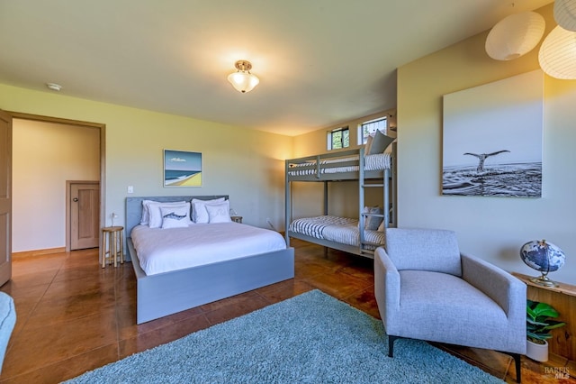 bedroom featuring tile patterned flooring