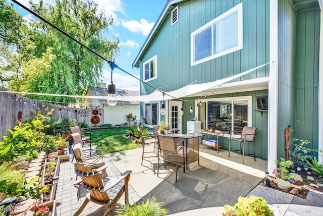 view of patio / terrace with outdoor dining area and a fenced backyard