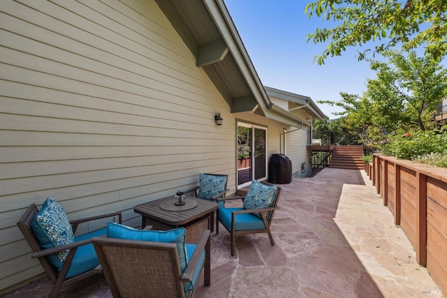 view of patio featuring fence