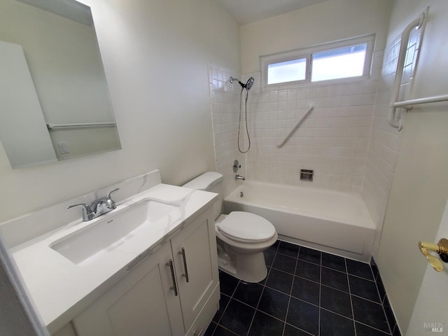 full bathroom with toilet, tile patterned floors, shower / washtub combination, and vanity