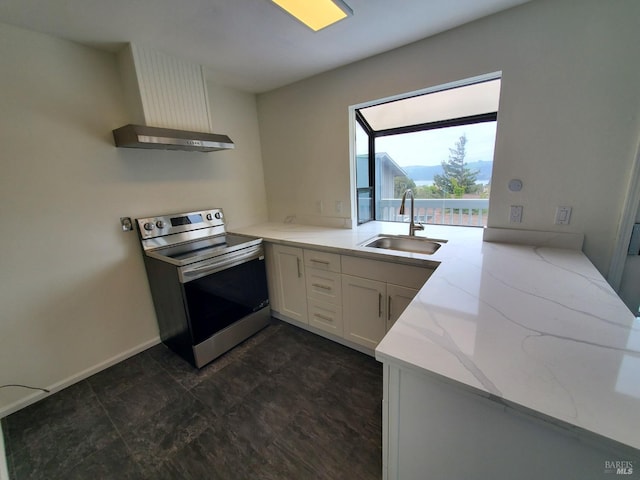 kitchen featuring exhaust hood, light stone countertops, a sink, stainless steel range with electric cooktop, and white cabinetry
