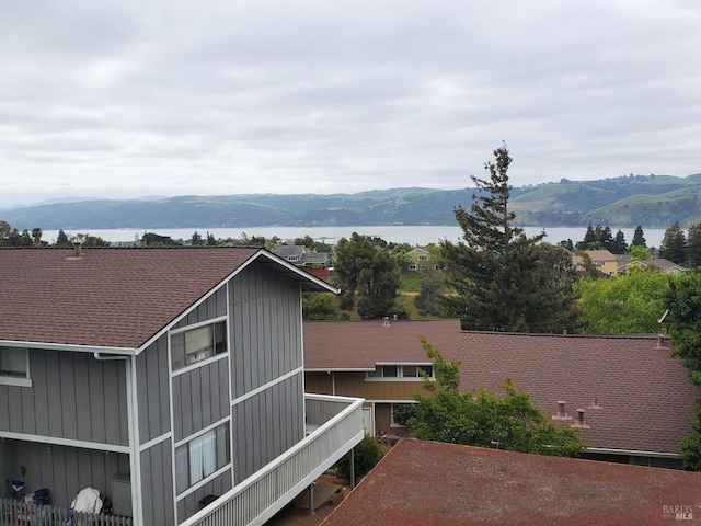 view of mountain feature with a water view