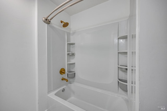 bathroom featuring  shower combination