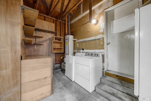 laundry room featuring gas water heater, washer and clothes dryer, and laundry area