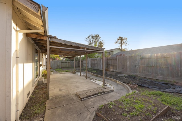 view of yard with a patio and a fenced backyard