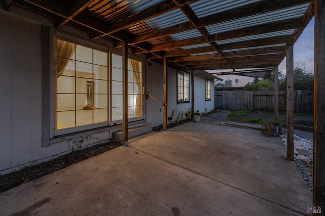 view of patio / terrace featuring entry steps and fence