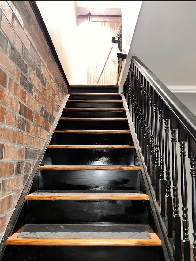stairs with brick wall