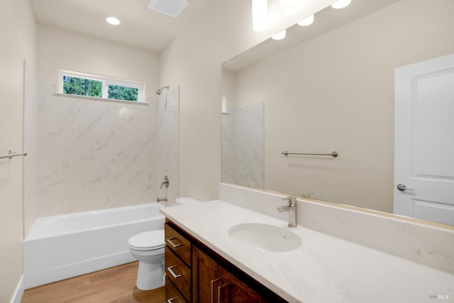 full bath featuring tub / shower combination, toilet, recessed lighting, wood finished floors, and vanity