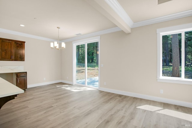 unfurnished dining area featuring crown molding, baseboards, a chandelier, and light wood-style floors